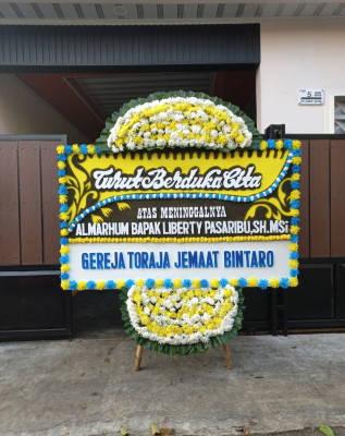 Papan Bunga Duka di Raba